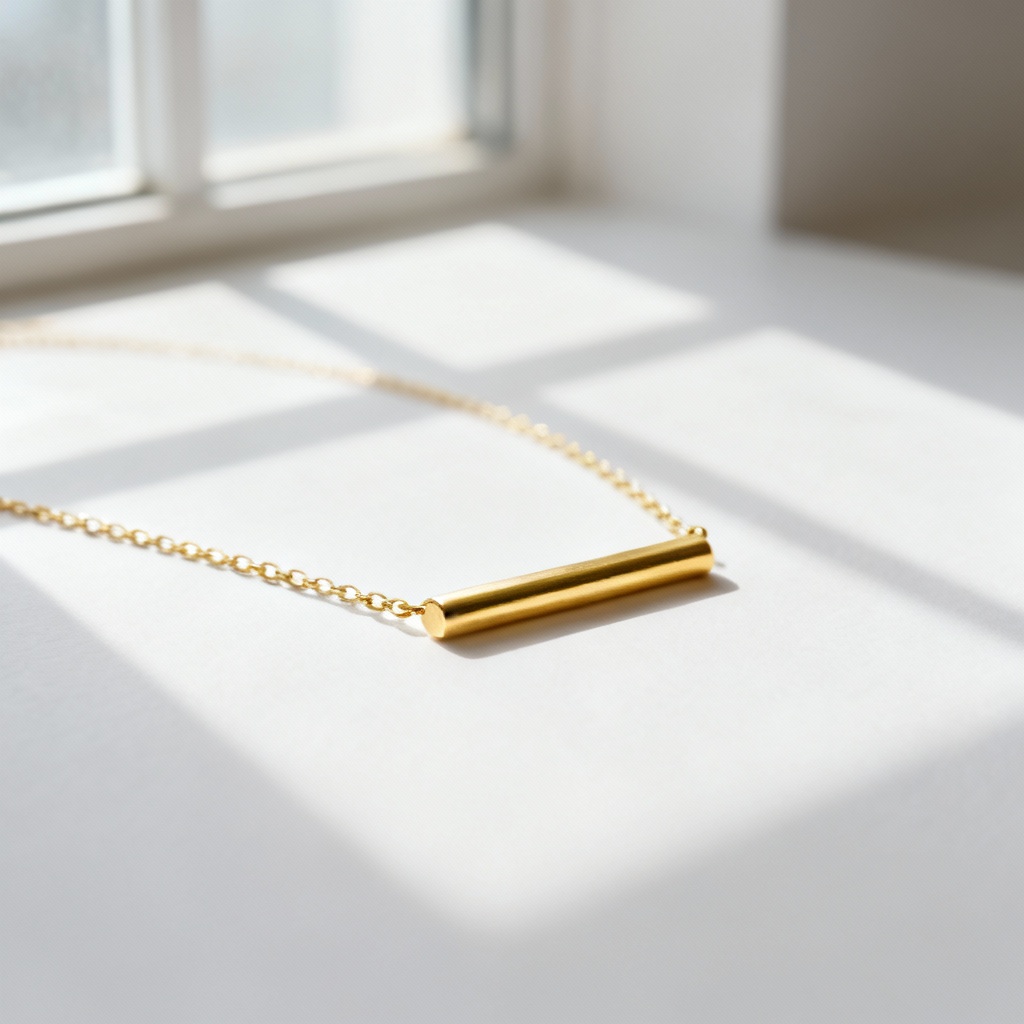 AI minimalist gold bar necklace on seamless white