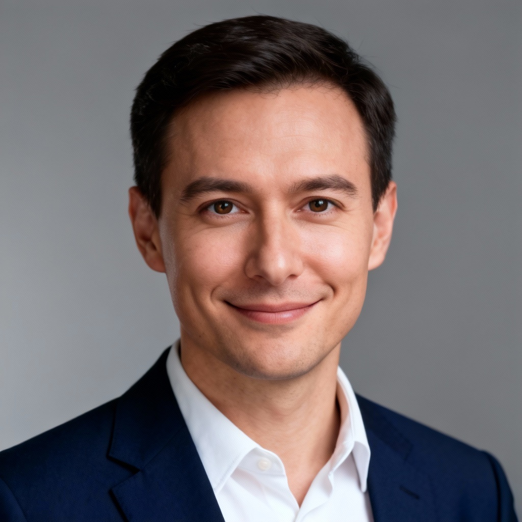 Corporate studio headshot with neutral backdrop